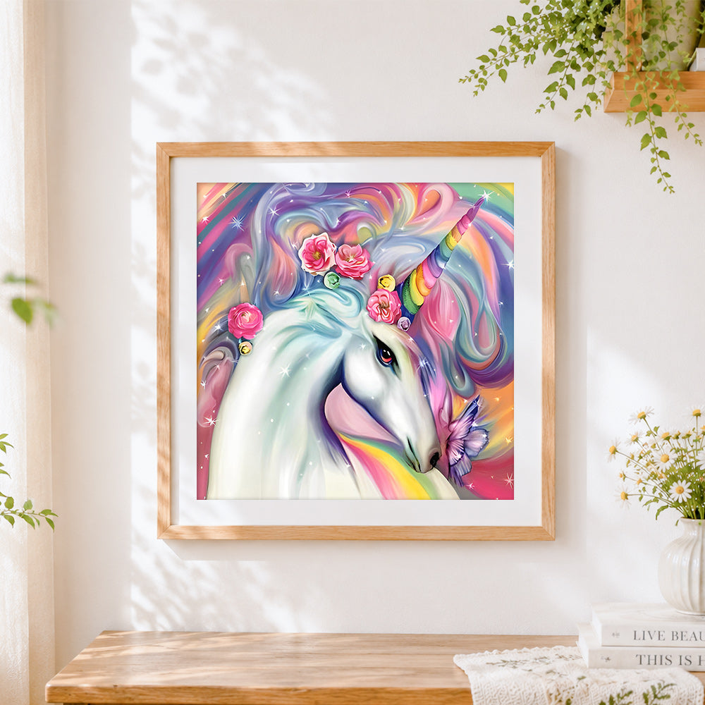 Finished majestic rainbow unicorn with roses cross stitch artwork displayed