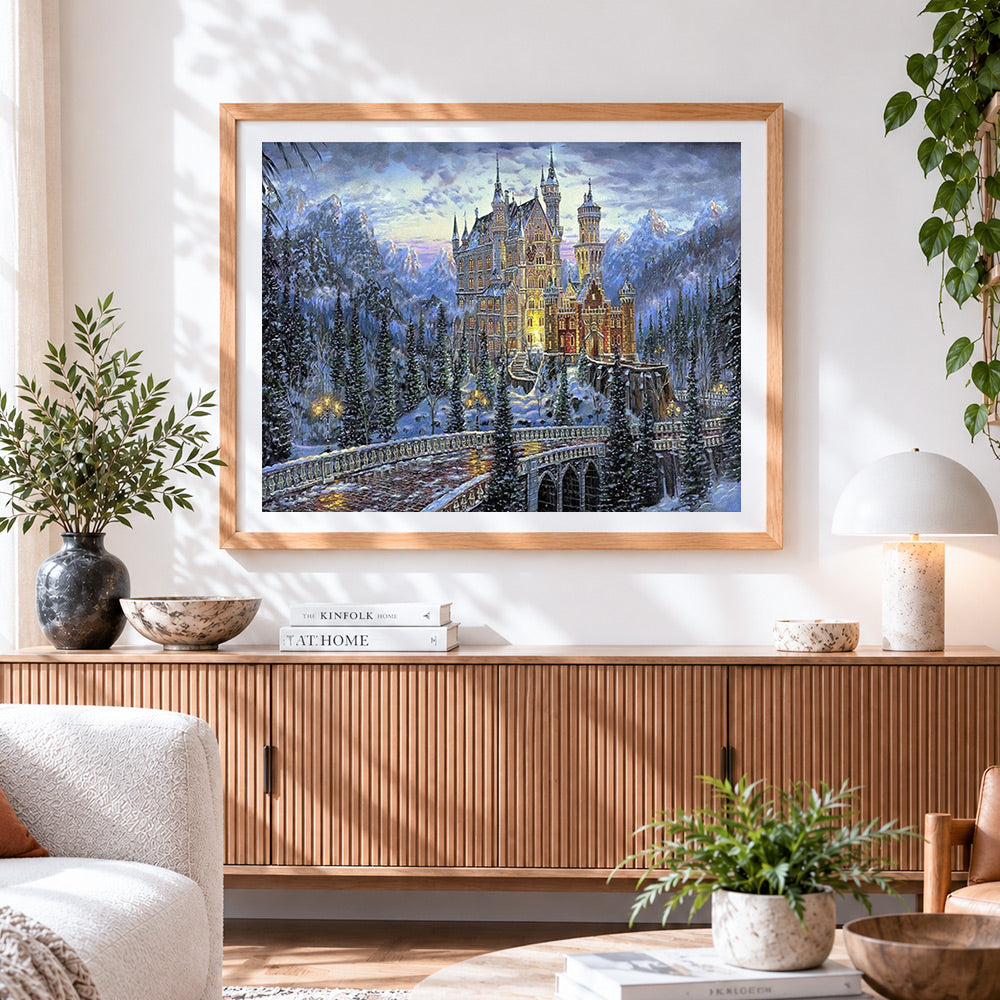Finished majestic snowy castle at twilight cross stitch artwork displayed