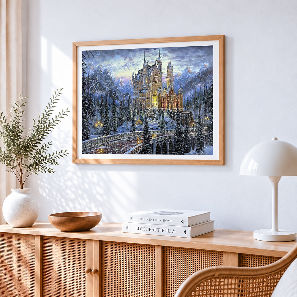 Majestic snowy castle at twilight cross stitch artwork displayed on wall as home decor