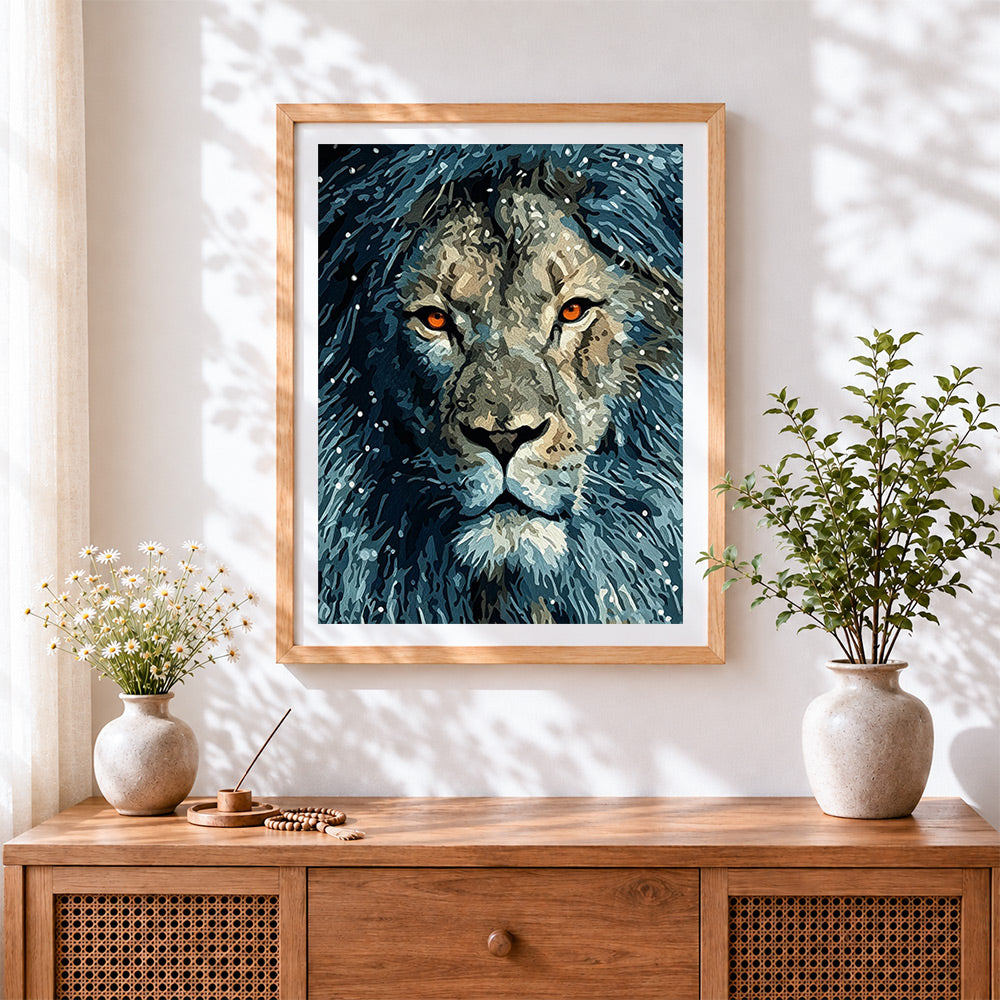 Finished majestic snowy lion cross stitch artwork displayed