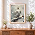 Finished majestic snowy owl cross stitch artwork displayed