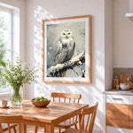 Majestic snowy owl cross stitch artwork displayed on wall as home decor