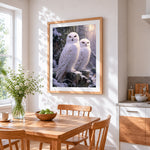Majestic snowy owls in winter forest cross stitch artwork displayed on wall as home decor