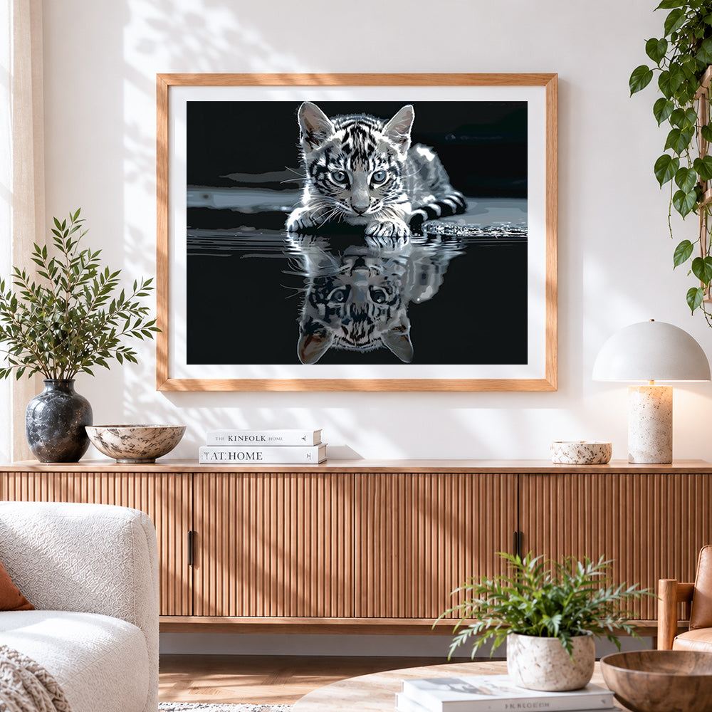 Finished majestic tabby kitten by the water cross stitch artwork displayed
