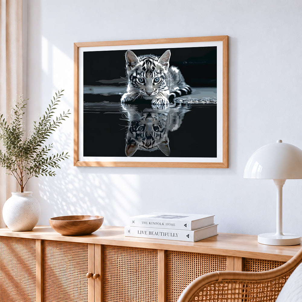 Majestic tabby kitten by the water paint by numbers artwork displayed on wall as home decor