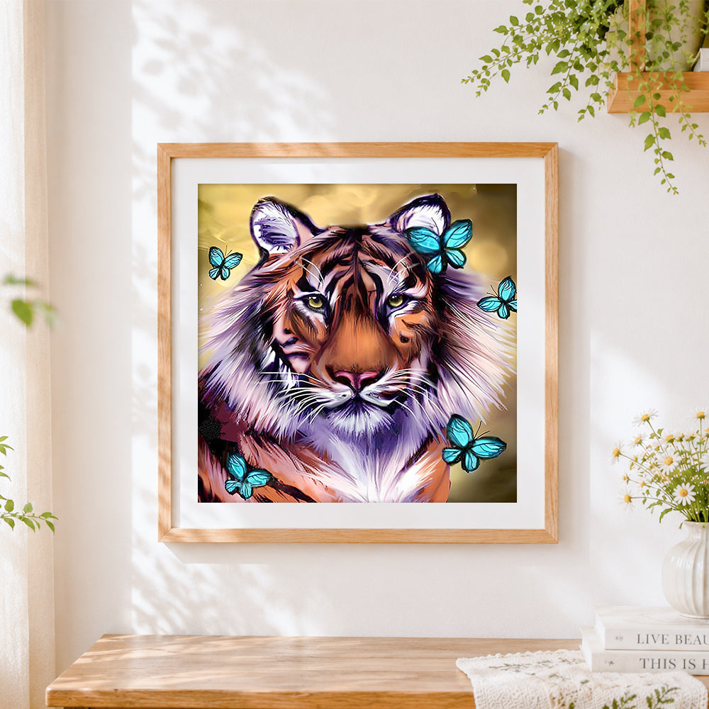 Finished majestic tiger and teal butterflies cross stitch artwork displayed