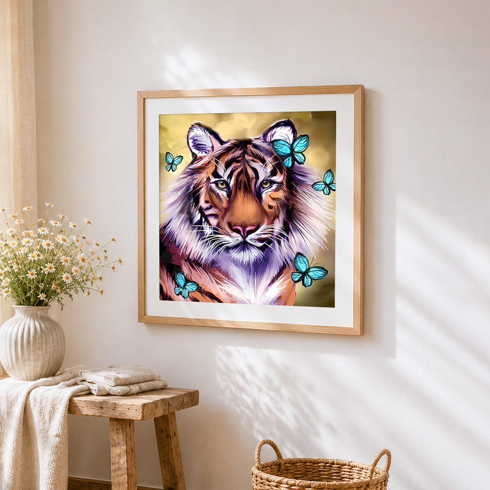Majestic tiger and teal butterflies cross stitch artwork displayed on wall as home decor