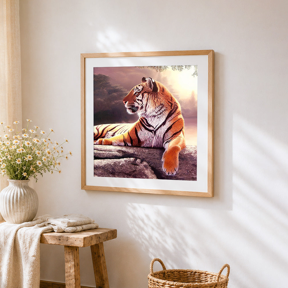 Majestic tiger resting at sunset cross stitch artwork displayed on wall as home decor