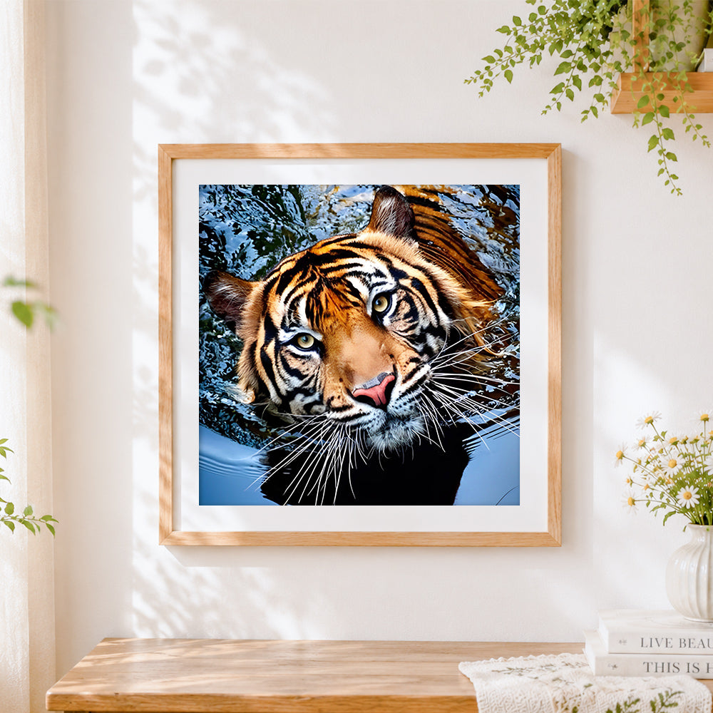 Finished majestic tiger swimming in water cross stitch artwork displayed