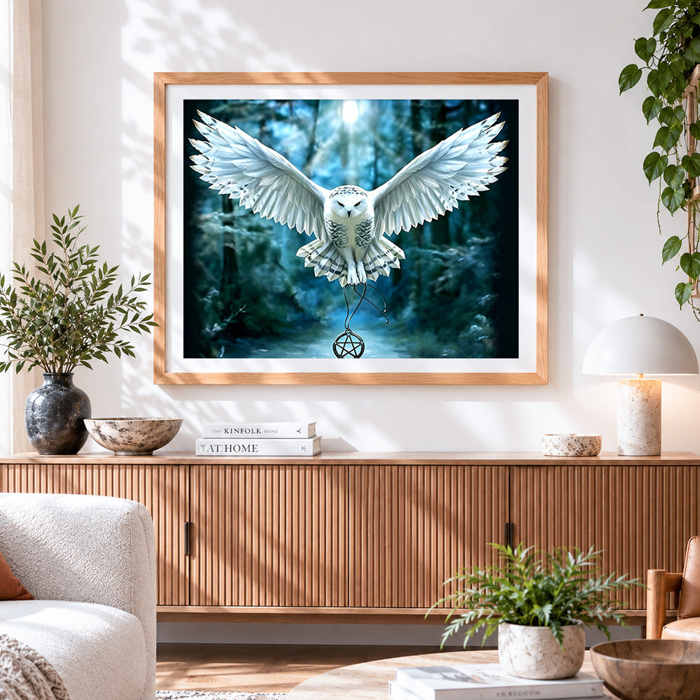 Finished majestic white owl with pentagram cross stitch artwork displayed