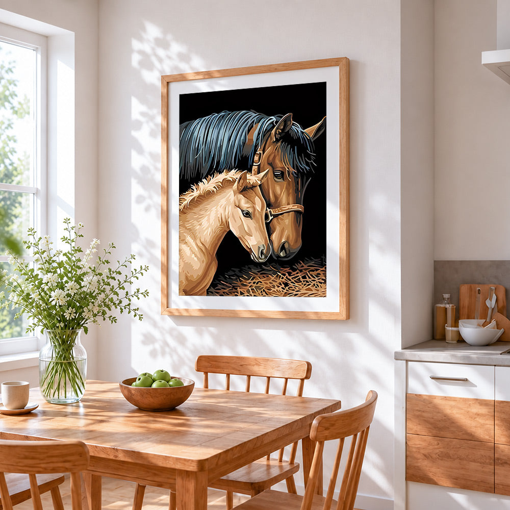 Mare and foal cross stitch artwork displayed on wall as home decor