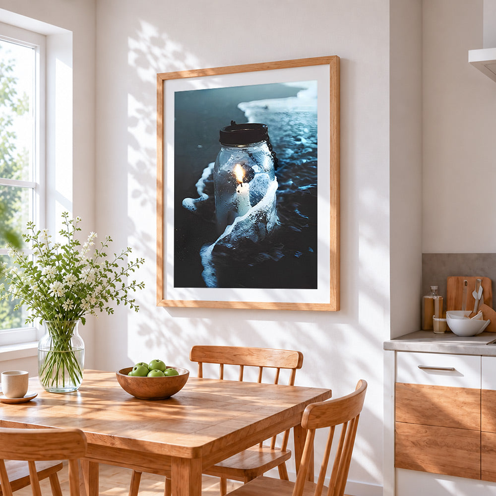 Mason jar candle in ocean waves cross stitch artwork displayed on wall as home decor