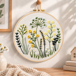 Meadow herbs hand embroidery hoop wall art displayed as warm and cozy handmade home decor
