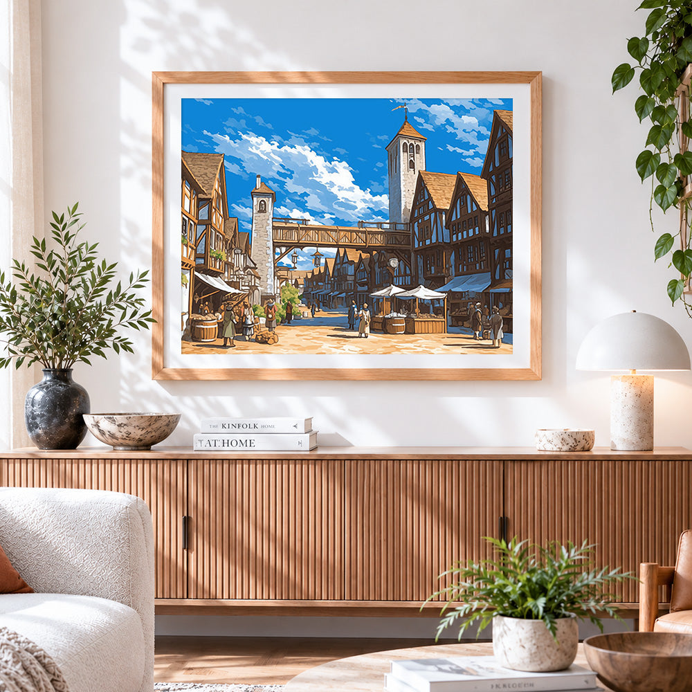 Finished medieval town street cross stitch artwork displayed
