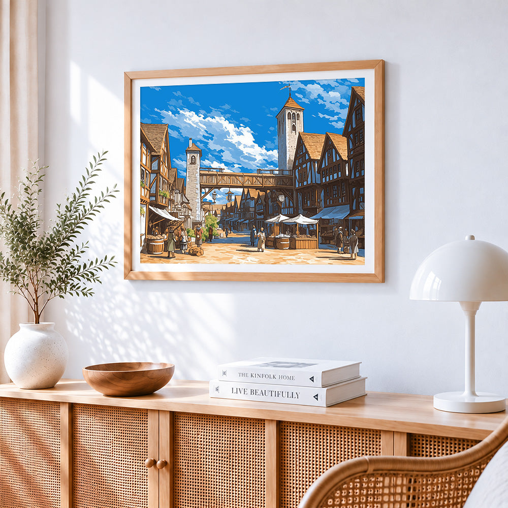 Medieval town street cross stitch artwork displayed on wall as home decor