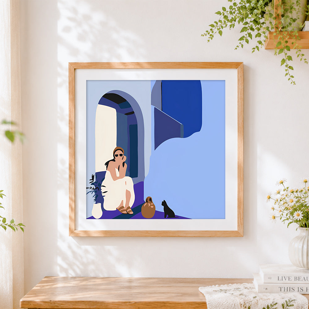 Finished mediterranean woman with cat cross stitch artwork displayed