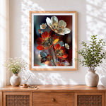 Finished metallic red and silver flowers cross stitch artwork displayed