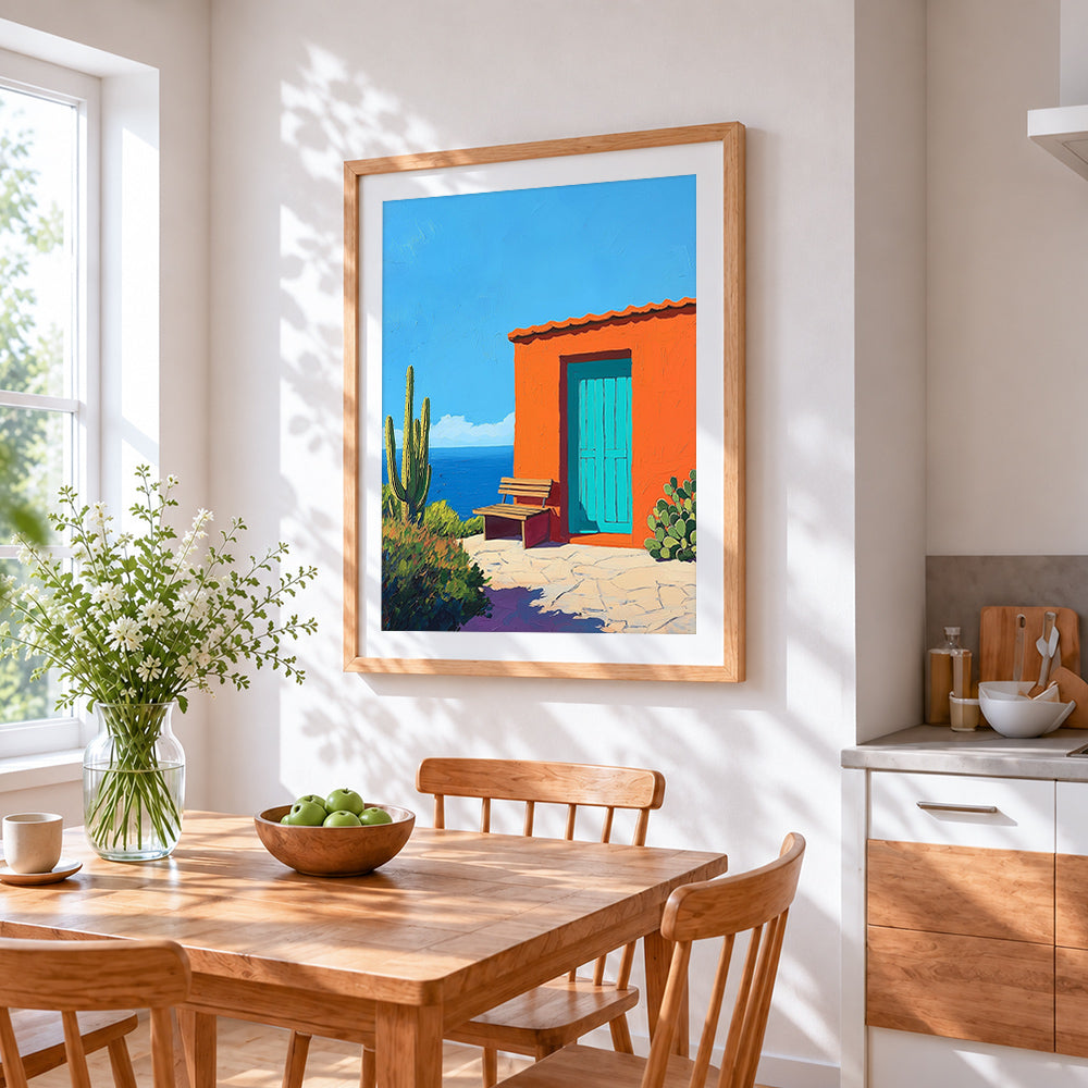 Mexican orange casita and cactus cross stitch artwork displayed on wall as home decor