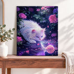 Finished midnight floral kitty pearl diamond painting artwork displayed as home decor
