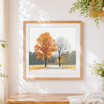 Finished minimalist autumn trees cross stitch artwork displayed