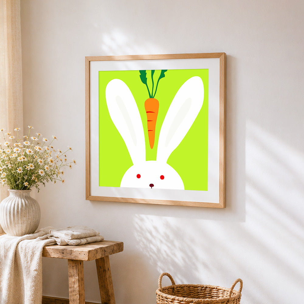 Minimalist bunny and carrot cross stitch artwork displayed on wall as home decor