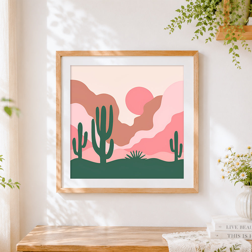 Finished minimalist desert cactus landscape cross stitch artwork displayed