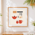 Finished minimalist hanging kitchenware cross stitch artwork displayed