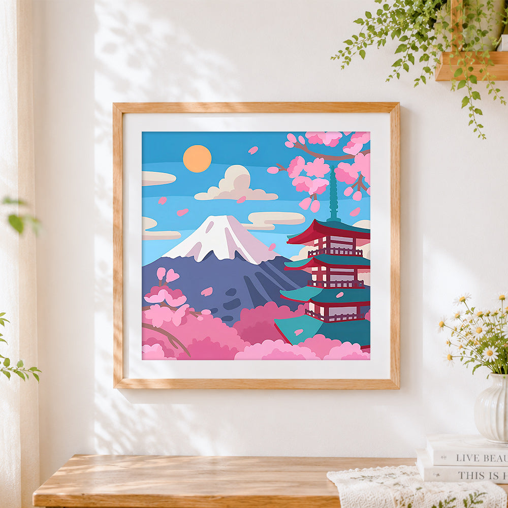 Finished minimalist mount fuji and pagoda cross stitch artwork displayed
