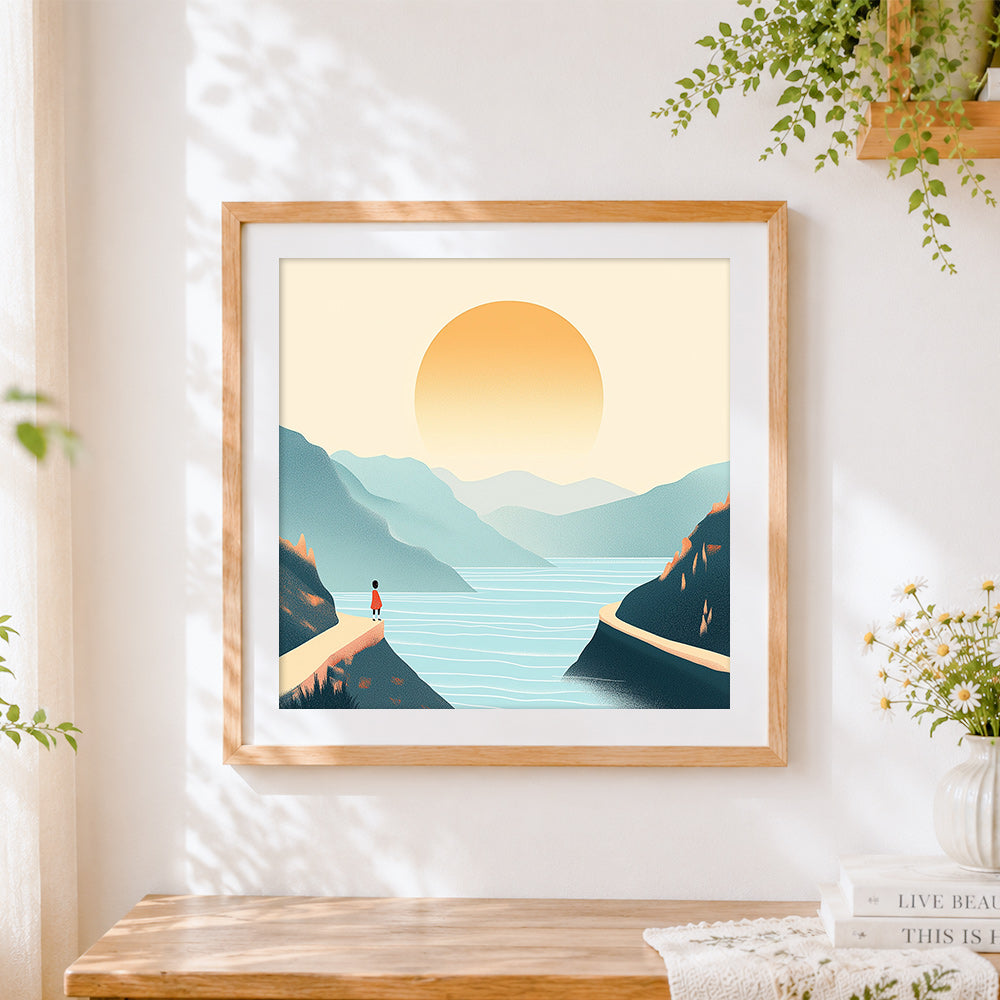 Finished minimalist mountains at sunrise cross stitch artwork displayed