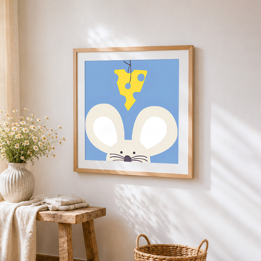 Minimalist mouse and cheese cross stitch artwork displayed on wall as home decor