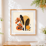 Finished minimalist neutral leaves and berries cross stitch artwork displayed