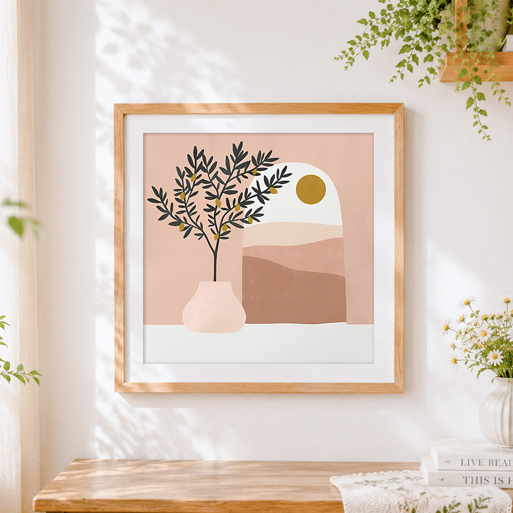 Finished minimalist olive tree and sun cross stitch artwork displayed