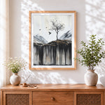 Finished minimalist winter tree and crows cross stitch artwork displayed