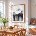Minimalist winter tree and crows cross stitch artwork displayed on wall as home decor