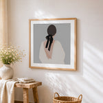 Minimalist woman with black bow paint by numbers artwork displayed on wall as home decor