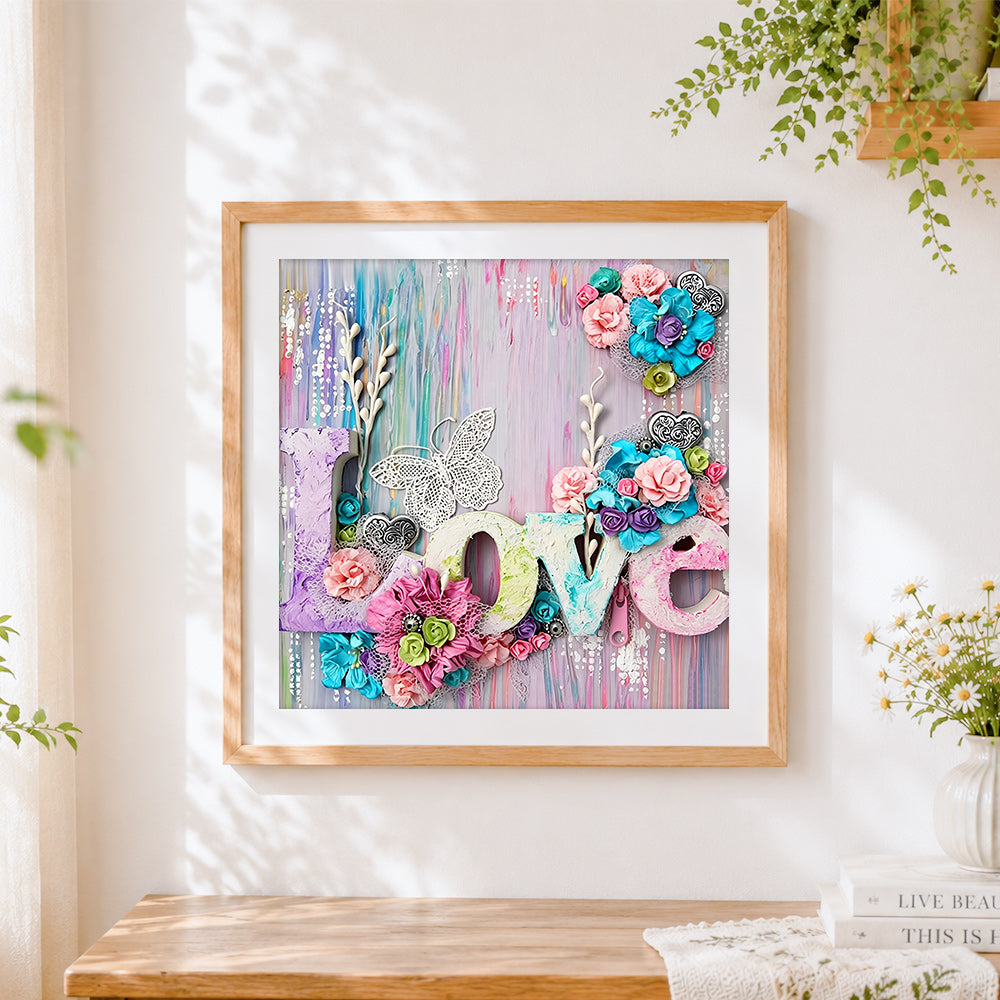 Finished mixed media love floral collage cross stitch artwork displayed