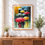 Finished modern colourful umbrellas in rain cross stitch artwork displayed