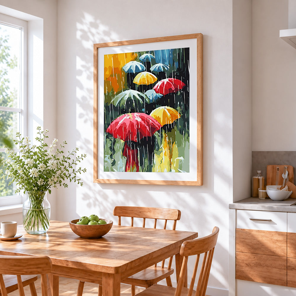 Modern colourful umbrellas in rain cross stitch artwork displayed on wall as home decor