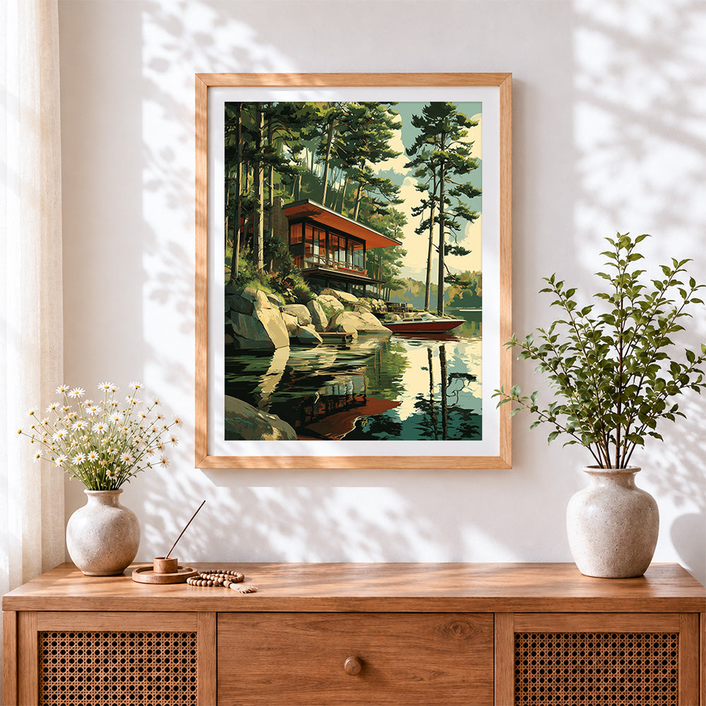 Finished modern lakeside cabin and speedboat cross stitch artwork displayed