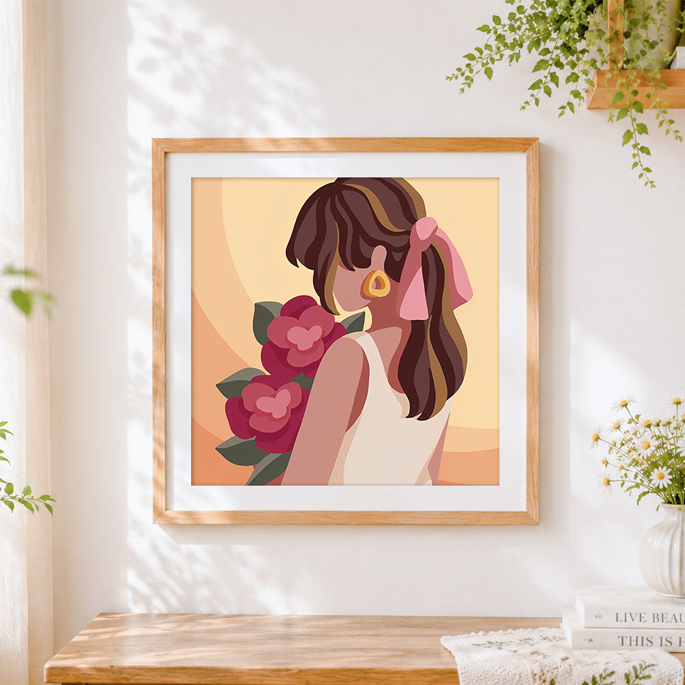 Finished modern minimalist floral portrait cross stitch artwork displayed