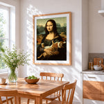 Mona lisa with a ginger cat cross stitch artwork displayed on wall as home decor