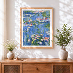 Finished monet style pink water lilies paint by numbers artwork displayed as home decor