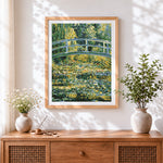 Finished monet style water lily pond and bridge paint by numbers artwork displayed as home decor