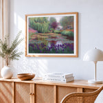 Monet style water lily pond cross stitch artwork displayed on wall as home decor