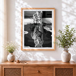 Finished monochrome cat and tiger reflection cross stitch artwork displayed