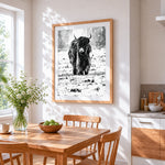 Monochrome highland cow in snow paint by numbers artwork displayed on wall as home decor