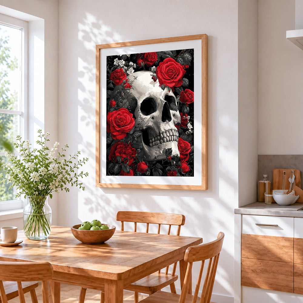 Monochrome skull with red roses cross stitch artwork displayed on wall as home decor