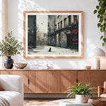 Finished moody monochrome street with cat cross stitch artwork displayed