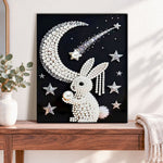 Finished moon bunny pearl diamond painting artwork displayed as home decor