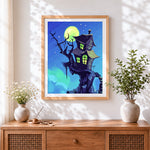Finished moonlit haunted house cross stitch artwork displayed